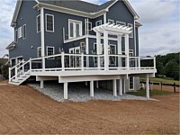 <b>Trex Select Decking with White Vinyl Railing with Black Aluminum Balusterswith Pergola over Grill Bump Out</b>